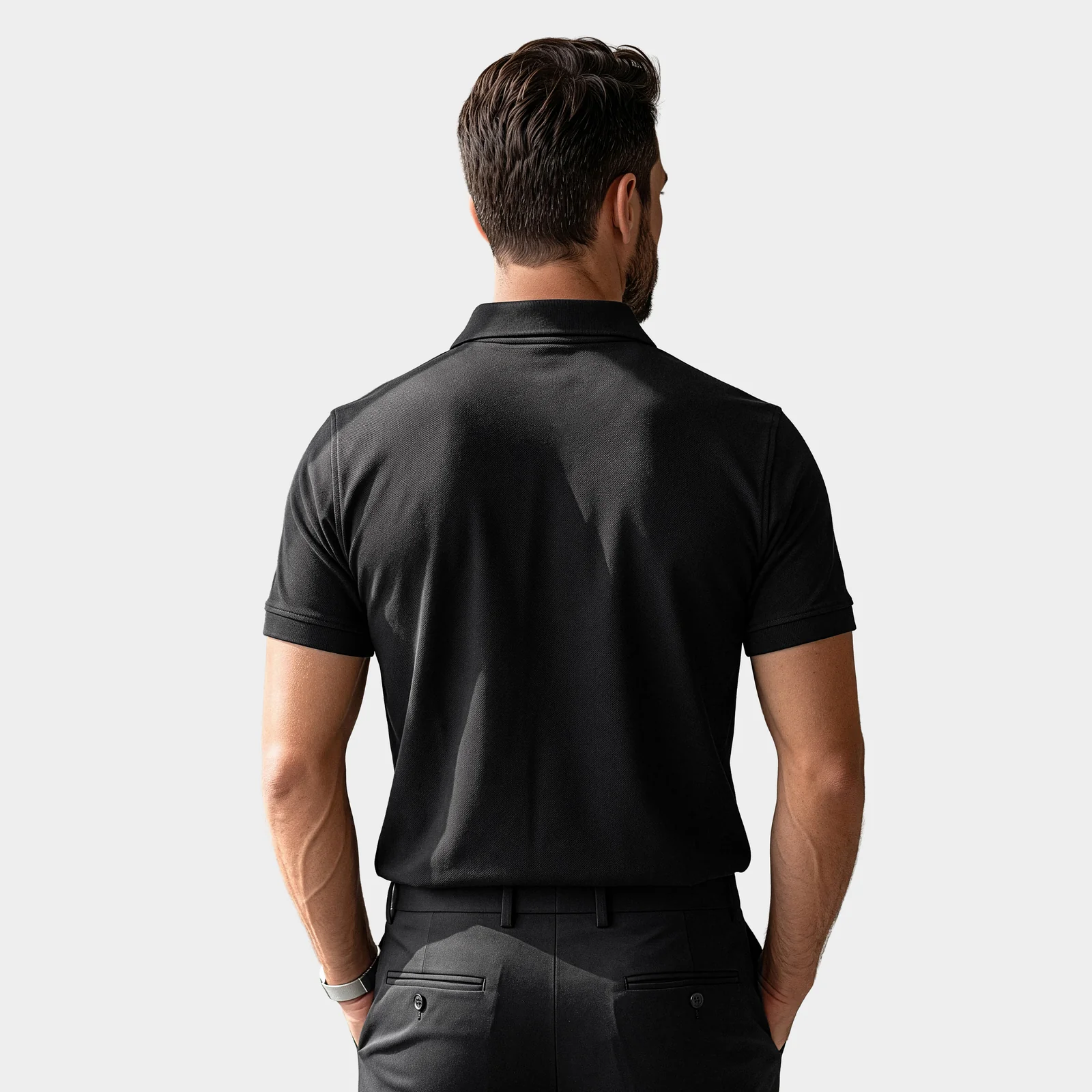Model wearing the black Casual Fit Polo, back view