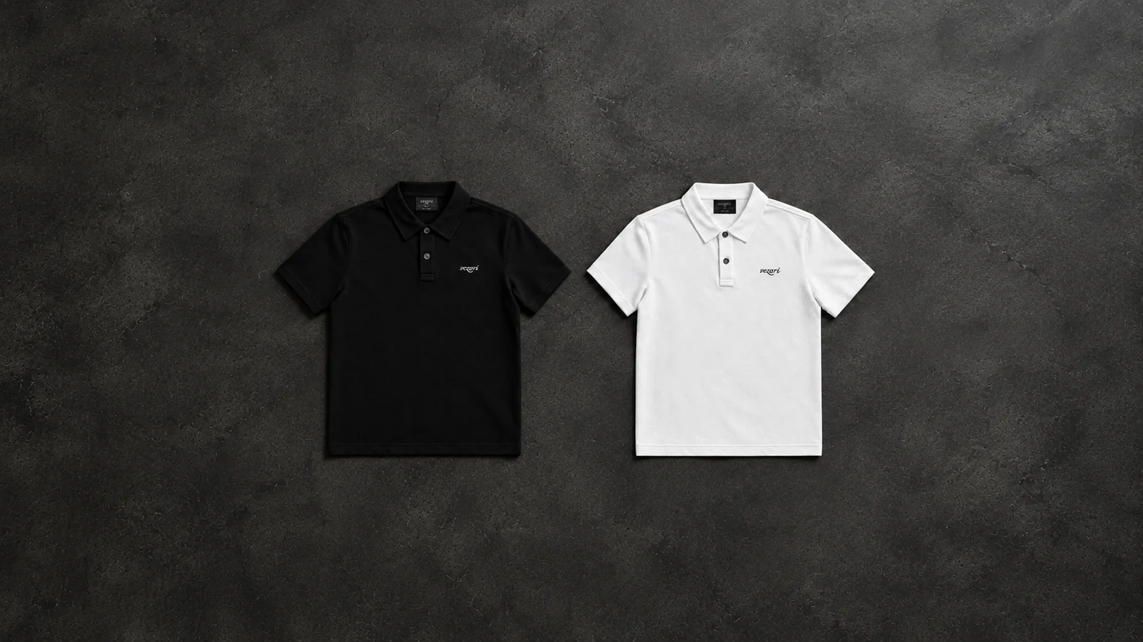 The black and white Casual Fit Polos side by side on a dark backdrop